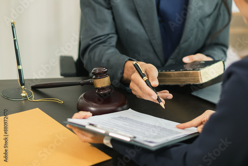 client meets with a lawyer within the legal counsel office to request advice about law and lawsuit that will be filed in order to obtain an advantageous outcome in lawsuit. legal counsel concept