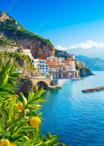 Beautiful view of Amalfi on the Mediterranean coast with lemons in the foreground, Italy