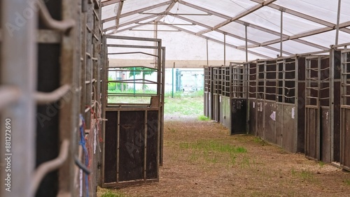 Empty Cattle Boxes in Temporary Stables Tent Barn During Cattle Market Trading Day