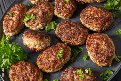 frikadeller, danish meatballs on a plate, top view