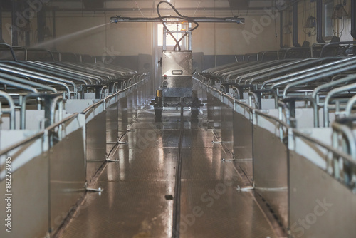 A robot washes a modern pig farm in Denmark