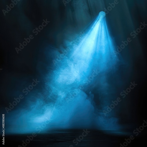 A vivid blue spotlight piercing through a haze of smoke on a black background, casting a mystical and captivating ambiance. 