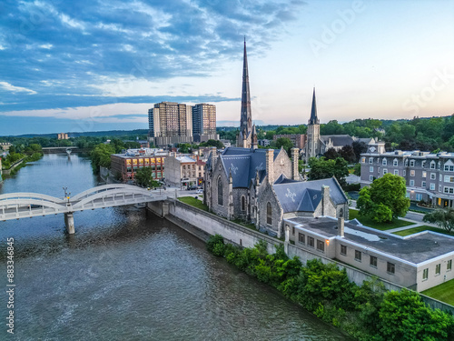 Aerial Birds Eye view of Cambridge Waterloo region Ontario Toronto Canada architecture European style building road street with cars and clouds in the sky