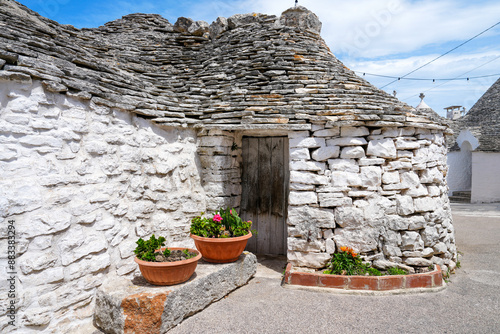 Traditional stone trulli house in Alberobello Italy