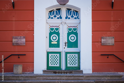 Tartu, Estonia - May 25, 2024: Close-up of Tartu city government and City Council name plates on the building.