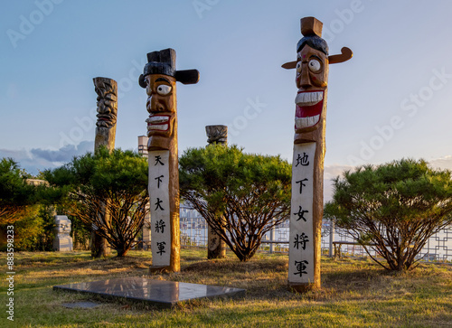 Dongsam-dong, Yeongdo-gu, Busan, South Korea - September 10, 2023: Morning view of wooden totem poles with General of the world and Female underground general on the park 