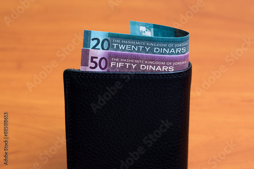 Jordanian dinar in the black wallet