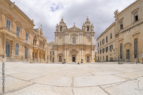 Panoramic picture of St. Paul's Cathedral in the historic Maltese city of Mdina with a deserted forecourt