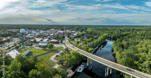 Aerial of Conway, small town on a bluff overlooking the Waccamaw River in South Carolina with typical main street, water tower, marina in Horry county