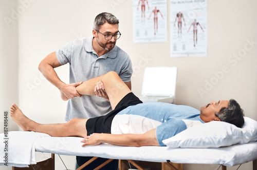 Leg pain, physiotherapy and man with mature patient for wellness, medical service and consulting. Healthcare, chiropractor and physical therapist with person for rehabilitation, recovery and help