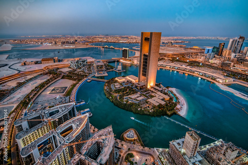 Enchanting night cityscapes of Manama, Bahrain, with its illuminated skyline, modern architecture, and vibrant nightlife. Perfect for travel enthusiasts seeking a glimpse of this Middle Eastern gem