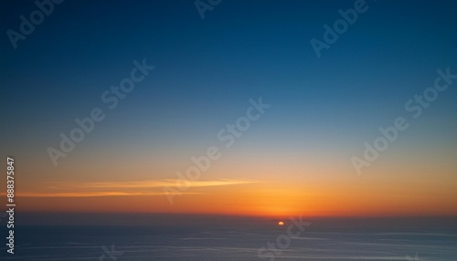 the sky before dawn was clear with an orange horizon and a blue atmosphere orange dawn sky smooth orange gradient background of the start of the day morning paradise with copy space sunset sunrise