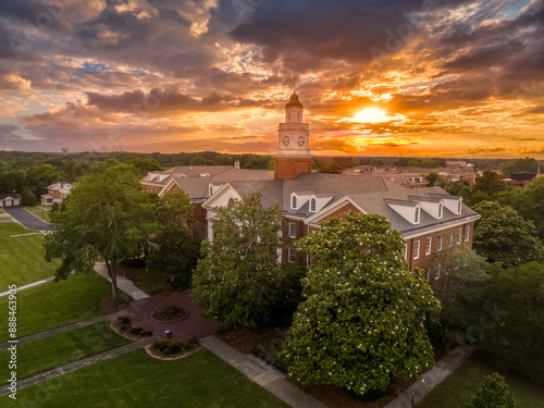 Aerial view of Virginia Hall, central building of Virginia State University public historically Black land-grant university in Ettrick with dramatic colorful sunset sky