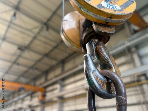 Chain on a Hook in Factory - Concept of Heavy Load Lifting