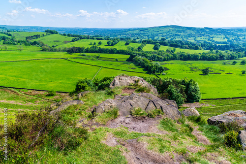 A view along a rocky outcrop at the northern end of the Roaches escarpment near to Lud's Church in Staffordshire in summertime