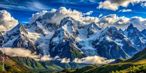 Majestic Mountain Peaks Piercing Through Clouds, Landscape Photography, Snow-capped Mountains, Blue Sky, Cloud Formations, Mountain Range, Nature Photography