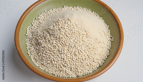 Watercolor illustration of white sesame seeds in a bowl