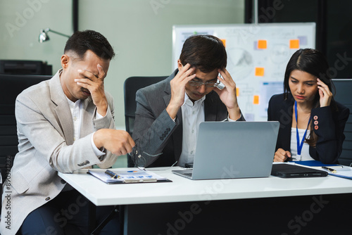 business team are under stress from working for poor work.