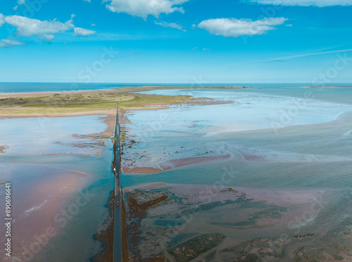 Lindisfarne, Northumberland, UK, June 19, 2024; high level aerial view to the west of Lindisfarne Causeway, Holy Island, Northumberland, England, UK.