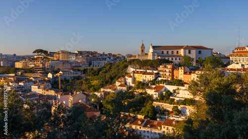 Aerial view of Lisbon cityscape, budlings with red roofs in Portugal, during sunset, the second-oldest European capital city