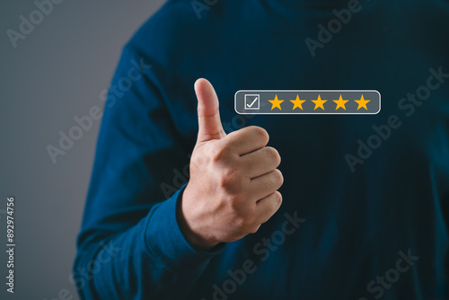 Close-up of a hand showing a thumbs-up gesture with a five-star rating overlay, signifying positive feedback and excellent customer satisfaction.