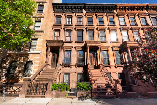 Harlem brownstones and entry steps (Mount Morris Park Historic District). Townhouse facades. Manhattan, New York City