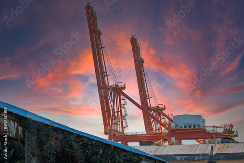 container cargo freight ship at sunset