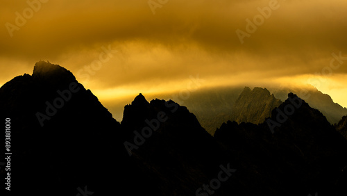 Dramatic sunrise over the Tatra Mountains. The Mount Ganek and Batizovsky Peak.