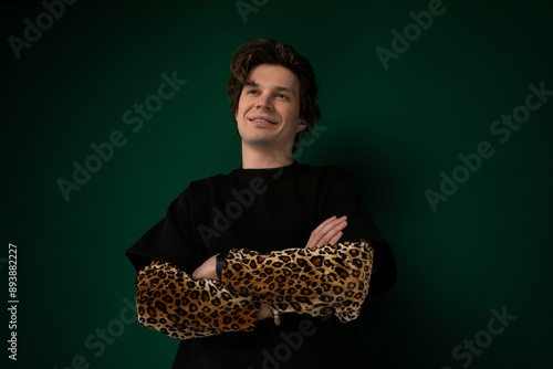 Man in Black Shirt and Leopard Print Arm Warmer