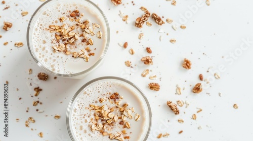 Fermented dairy drinks with granola on white background Promoting gut health and healthy gut flora