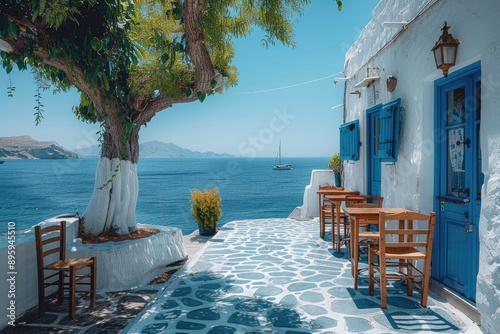 Typical blue and white Greek restaurant, taverna by the sea