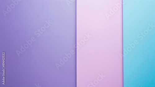 Minimalist image showing three vertical color blocks in purple, pink and blue, providing a vibrant and modern backdrop. The solid colors and clean lines create a sense of balance and harmony