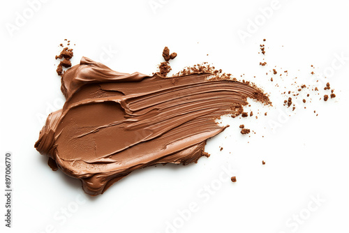 Trace de matière marron, Texture de pâte à tartiner ou maquillage sur fond blanc, chocolat