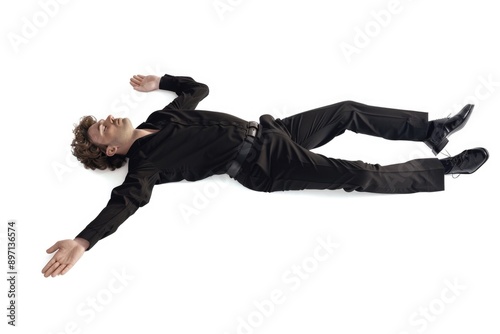 A person lying down on the ground, likely injured or unconscious