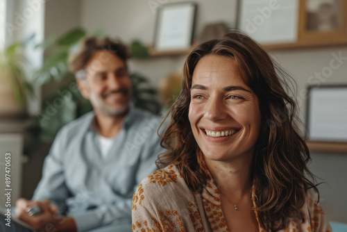 female patient talking with male hypnotherapist