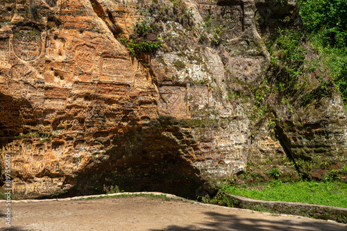 a beautiful described cave in a macaw park in a sunny day