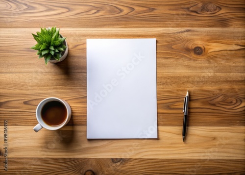 Minimalist wooden desk with a crisp blank sheet of white paper, awaiting creative expression, surrounded by ample space for notes and ideas to flow freely.