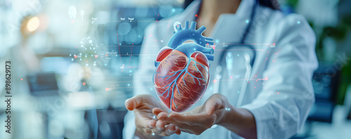 Hands of a doctor holding human heart. Health and cardiological diseases concept.