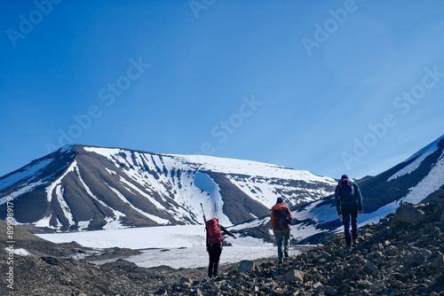 Hiking in Svalbard glacier in summer time