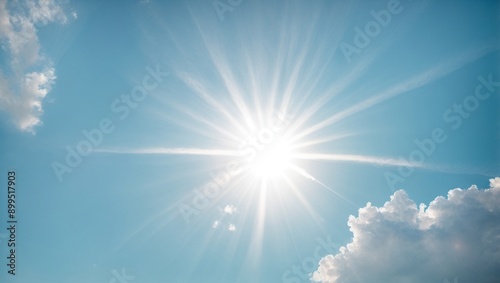 Sun's Radiance: A bright sun starburst against a vibrant blue sky with fluffy white clouds. 