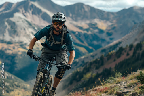 Man Biking on Rugged Mountain Trail