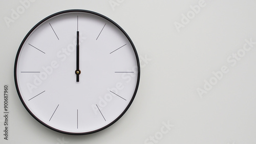 Wall Clock Showing 12.00 or 0.00 O'Clock on White Wooden Surface - Perfect for Time Management and Scheduling Concepts