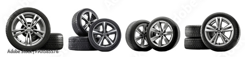 Several car tires are arranged artistically on a white background, showcasing various designs and tread patterns in a well-lit setting