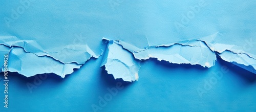 ripped blue paper.