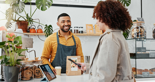 Woman, smartphone and tablet with cashier in coffee shop to pay for sale, ecommerce and digital checkout. Customer, happy and technology for internet banking, payment and online transaction in cafe.