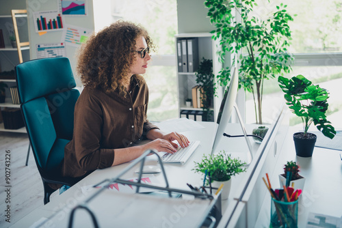 Photo of lovely successful woman business agency workstation coworking space office indoors