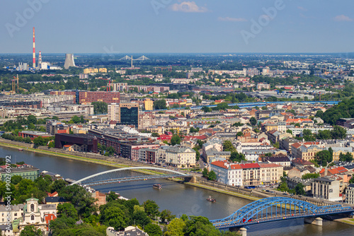 Bridges leading from Kazimierz through Vistula river to Podgorze district and PGE Power Station on the background. View from observation viewing platform on tethered balloon Balon Widokowy