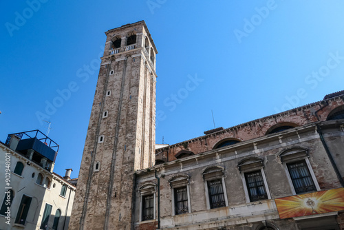 Scenic view of church San Silvestro in Venice, Veneto, Italy, Europe. Venetian architectural landmarks and old houses facades. Urban tourism in summer. Discover the residential area in city of