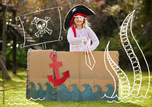 Garden, pirate and portrait of child in box with creativity for playing, pretend games and fun. Family, backyard and happy girl for cruise, voyage and adventure for fantasy, captain boat and costume