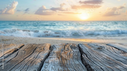 Weathered driftwood surface with a soft-focus background of a serene beach, ideal for coastal decor or beach-themed accessories